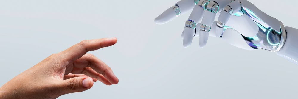 Mano de humano y robot acercándose